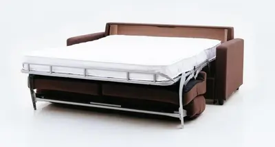 a bed with a white mattress on top of it at Mint Studio in Druskininkai