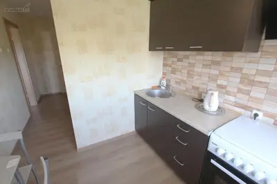 a kitchen with a sink and a counter top at Tilžės Apartment in Šiauliai