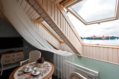 a room with a table and a window at Viva Trakai in Trakai