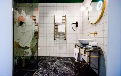 a bathroom with a sink and a shower at Ego SPA - Adults Only in Birštonas