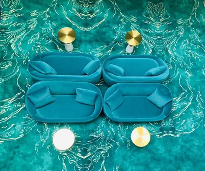 two blue chairs sitting on top of a table at Ego SPA - Adults Only in Birštonas