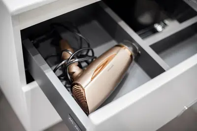 a computer mouse sitting in a white drawer at #stayhere - Central Castle View Riverside Apartment in Vilnius