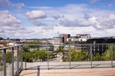 a view of a city from a balcony at #stayhere - Central Castle View Riverside Apartment in Vilnius