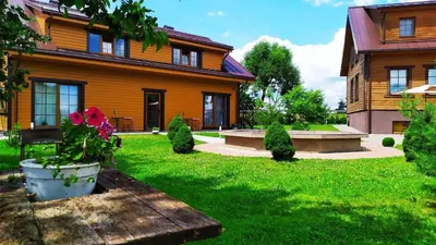 a house with a green yard in front of it at 