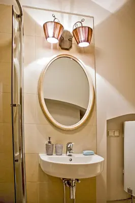 a bathroom with a sink and a mirror at Gaono apartment Free Parking in Vilnius