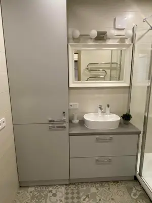 a bathroom with a sink and a mirror at DanGinta in Druskininkai