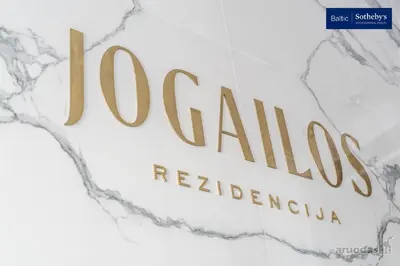 a sign for the los angeles regina restaurant at Jogailos Residence peaceful Old Town luxury 3 bdr, 2 bthr, FREE GARAGE, top-speed WIFI in Vilnius