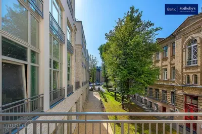 a view of an alley between two buildings at Jogailos Residence peaceful Old Town luxury 3 bdr, 2 bthr, FREE GARAGE, top-speed WIFI in Vilnius