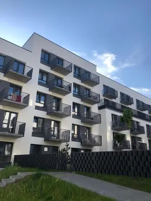 an apartment building with balconies on the side of it at Ozas Apartment 1 and 2 in Vilnius
