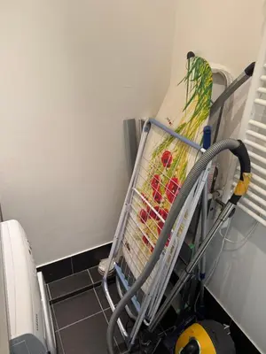 a shopping cart in a room with food in it at Helios Luxury apartment in Vilnius skyscraper in Vilnius