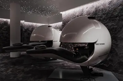 two white helmets sitting next to each other in a room at Mana Sleep & Spa in Druskininkai