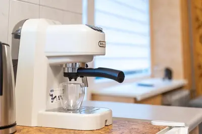 a mixer sitting on top of a counter at Wonderful Apartment in the City Center in Šiauliai