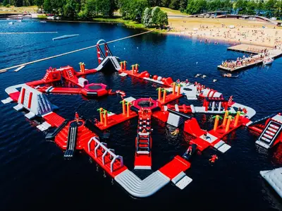 an aerial view of an amusement park in the water at Pas Romaną in Zarasai