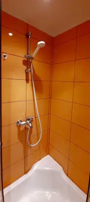 a bathroom with a shower and a sink at M&M Apartment VIII Self CHECK-IN in Panevėžys