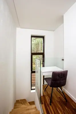 a small room with a desk and a chair at Pine Home in Druskininkai