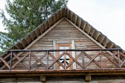 a wooden building with a window on top of it at ETNO house in Ricieliai