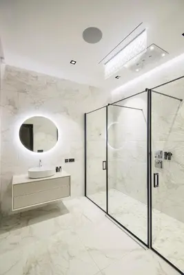 a bathroom with a sink and a mirror at Luxury Smart Home Apartment in Vilnius Old Town, Sleep on Hästens in Vilnius