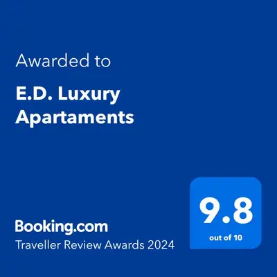 a screenshot of a phone with the text awarded to ed luxury apartments at E.D. Luxury Apartaments in Šiauliai