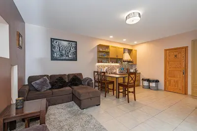 a living room with a couch and a table at Calm and private apartment by Polo Apartments in Kaunas