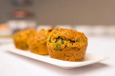 a muffin on a plate on a table at ORO Dubingiai in Giraičiai