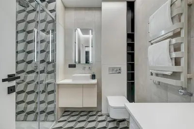 a bathroom with a sink and a toilet and a mirror at HaPPy Inn G, Self check-in, Terrace, Underground Parking in Vilnius