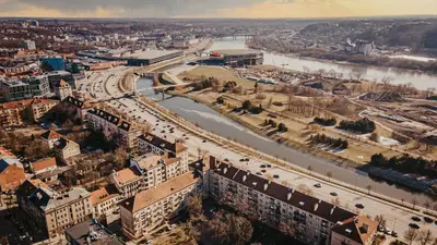 an aerial view of a city and a river at Wonderful Apartment In The Heart Of Kaunas Center in Kaunas