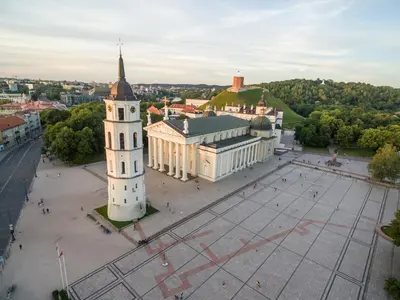an aerial view of a building with a clock tower at St Anne studio in Vilnius