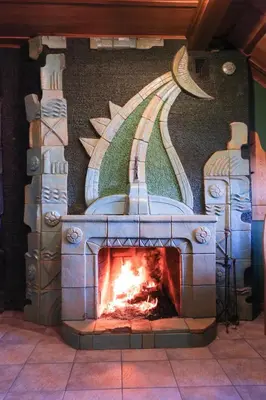 a brick oven with a painting on the wall at Hotel Jonapolis in Jonava
