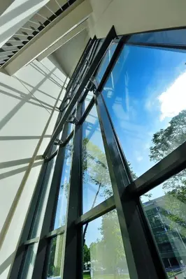 a window in a building with a view of the sky at Eva R Apartments in Druskininkai