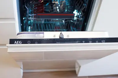 a dishwasher with its door open with a dish washer at Heart of Vilnius Apartment in Vilnius