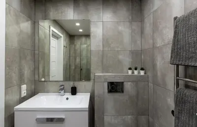 a bathroom with a sink and a mirror at Studio Ligita near Egle in Druskininkai
