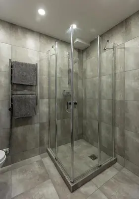 a shower with a glass door in a bathroom at Studio Ligita near Egle in Druskininkai