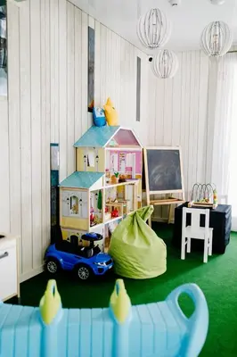a room with a toy house and a toy car at Green Town in Vievis