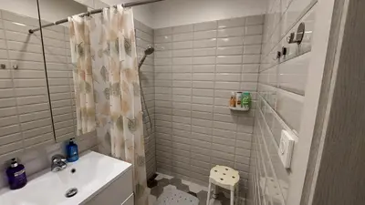 a bathroom with a shower and a sink at Čepinskio in Kaunas