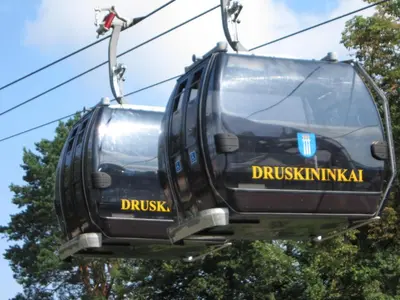 a cable car with the words dynkuskaigunigun at Amazing Snow Apartments in Druskininkai