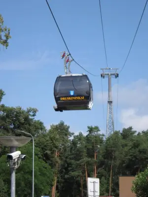 a car on a cable car in the sky at Amazing Snow Apartments in Druskininkai