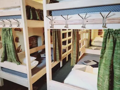 a group of bunk beds in a room at HelloVilniusHostel in Vilnius