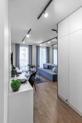 a living room with a couch and a table at Brand new apartment in Vilnius in Vilnius