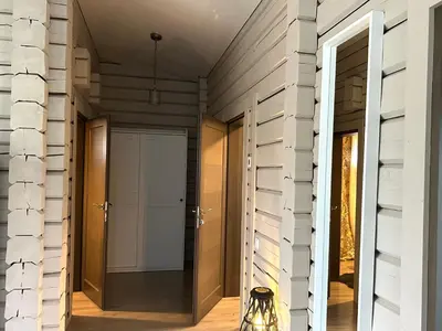 a hallway of a house with a door at Lazariškio apartamentai in Martyniškėnai