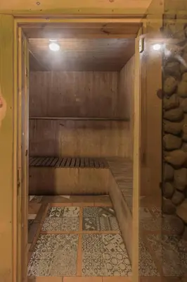 an inside view of a sauna in a house at Super Sodyba in Pamusiai