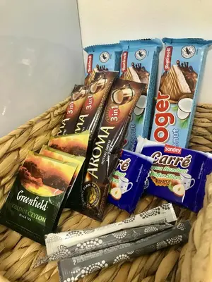 a basket filled with different types of chocolate chips at River Park apartments Ukmerge in Ukmergė