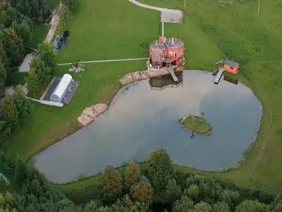 an aerial view of a tractor on a pond at Brazylija VIP vasarnamis in Kryliai