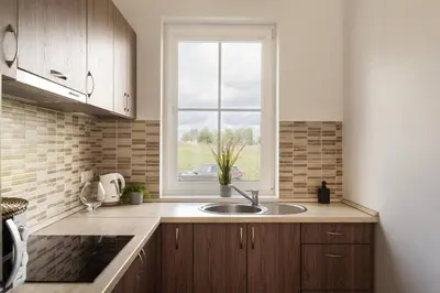 a kitchen with a sink and a window at 1 House Between two lakes in Vilnius