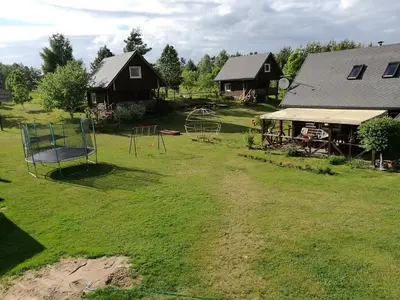 an aerial view of a yard with a playground at Likimo ratas in Paliepis