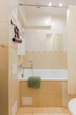 a bathroom with a tub and a sink at Cozy studio and standard apartments in the heart of Oldtown in Vilnius