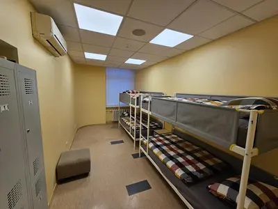 a row of bunk beds in a room at Mr Jo’s hostel in Kaunas