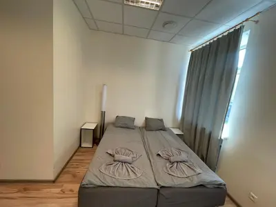 a bedroom with a bed in a room at Mr Jo’s hostel in Kaunas