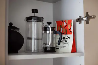 a kitchen counter with a blender on a shelf at #stayhere Modern & Compact 1BDR Uptown Vilnius in Vilnius