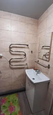 a bathroom with a sink and a toilet in it at Elite Flats One bedroom in Utena