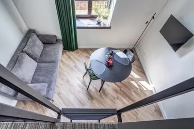 an overhead view of a living room with a table and a couch at Angel House Vilnius, Old Town 6 in Vilnius